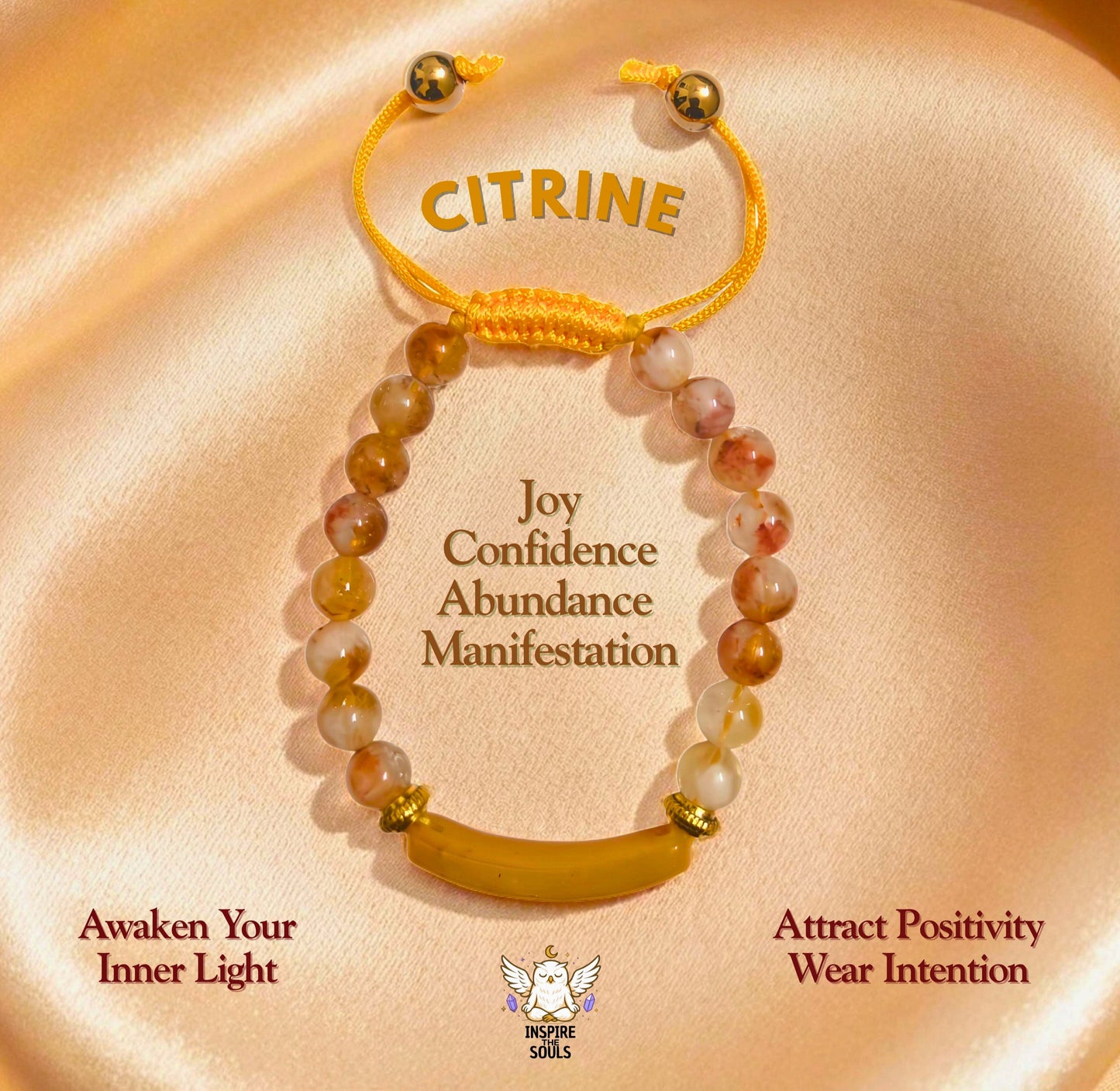 Golden Glow – Citrine Bracelet from the SoulStone Series by InspireTheSouls, featuring a polished citrine centerpiece, gold-toned accents, and natural citrine beads, styled on golden silk fabric with dried marigold petals