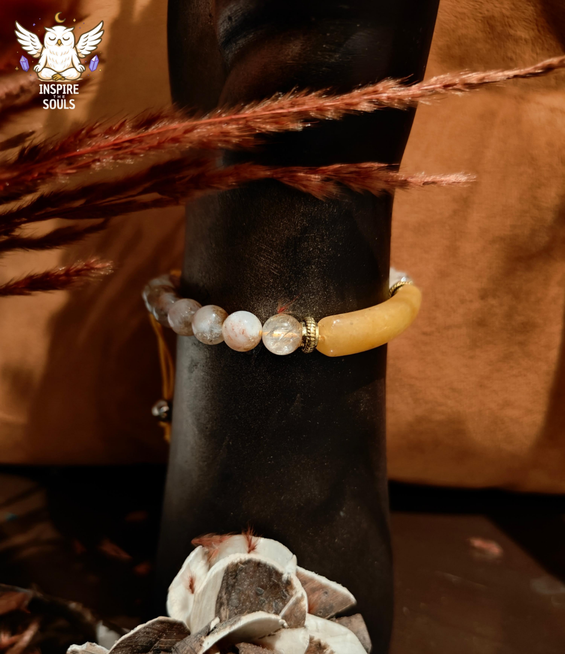 citrine Bracelet with beads on a horse's leg, with 'Inspire the Souls' logo in the corner.